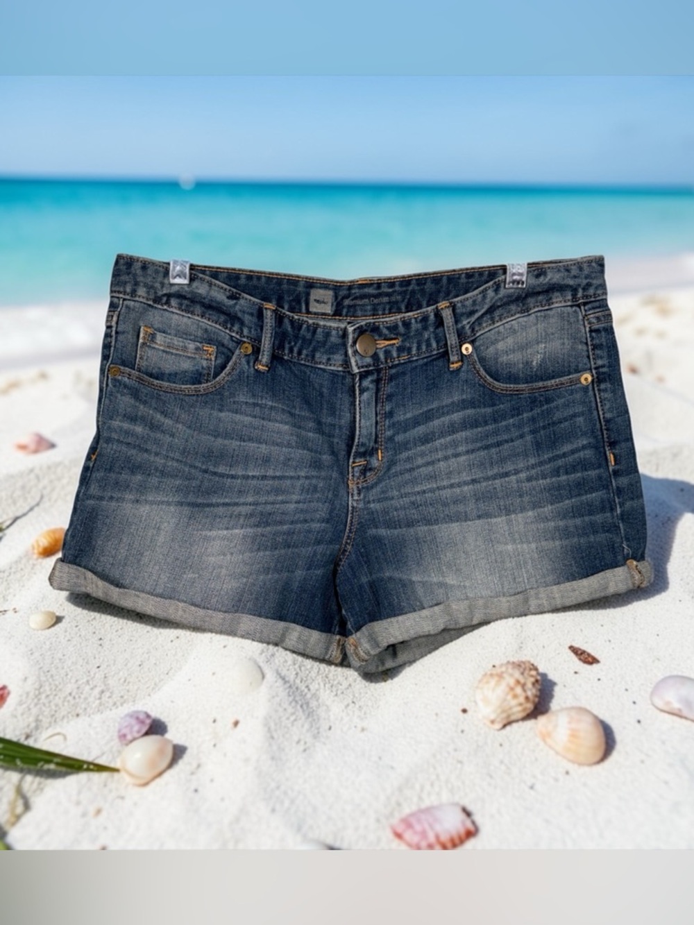Mossimo Supply Co. blue denim cuffed shorts.